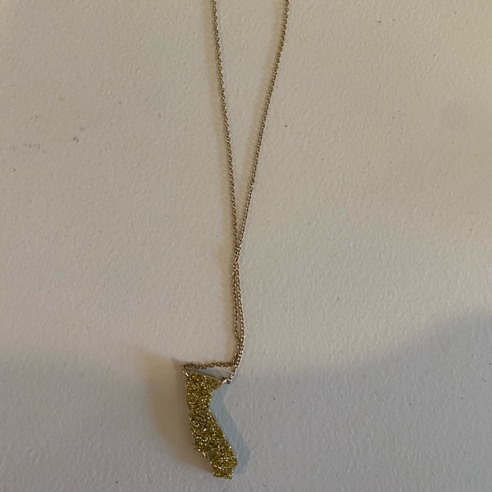 BaubleBar state necklace, glitter gold California
